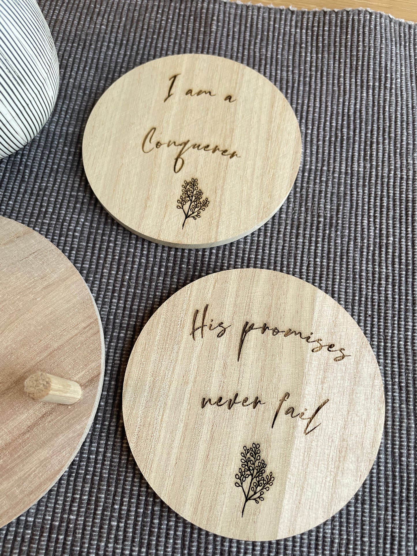 Two coasters Birds Eye front view, beige engraved close up