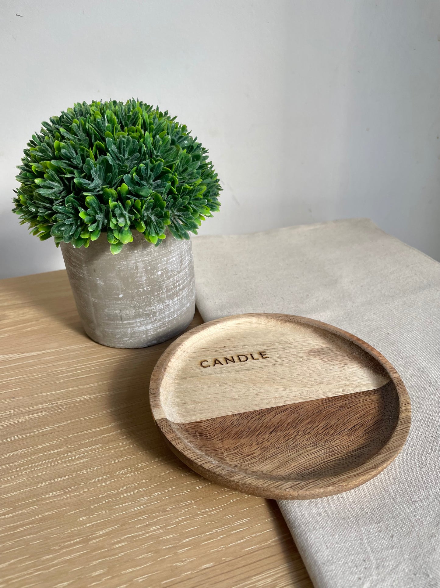 acacia wooden candle plate, engraved with word candle