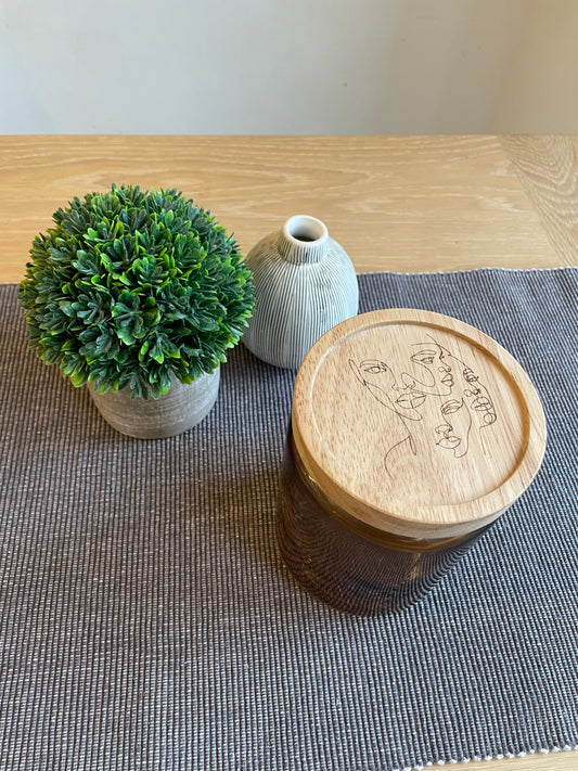 amber storage jar with wood lid, side view